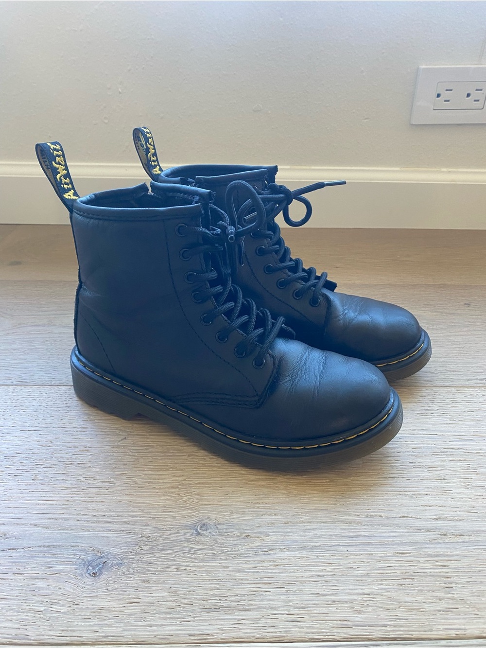 Dr. Martens Kids Black Leather Lace-Up Combat Boots with Yellow Stitching